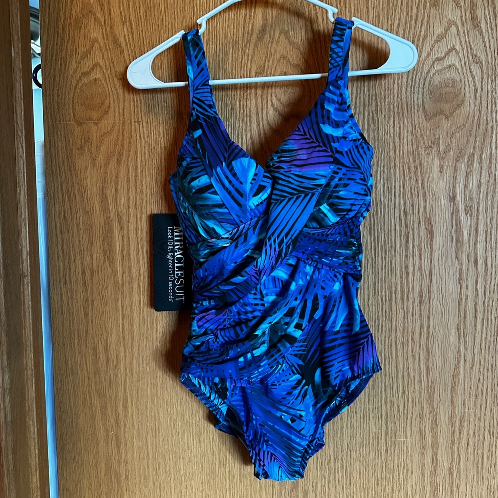 Miraclesuit size 12 Chico’s swimsuit , worn twice.